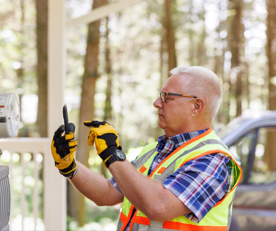 Man installing energy saving measures