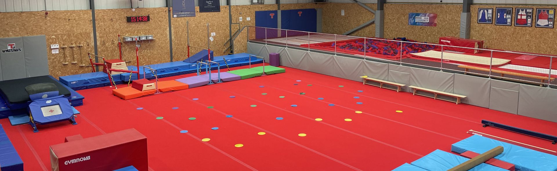 An image showing an hall full of gymnastics equipment