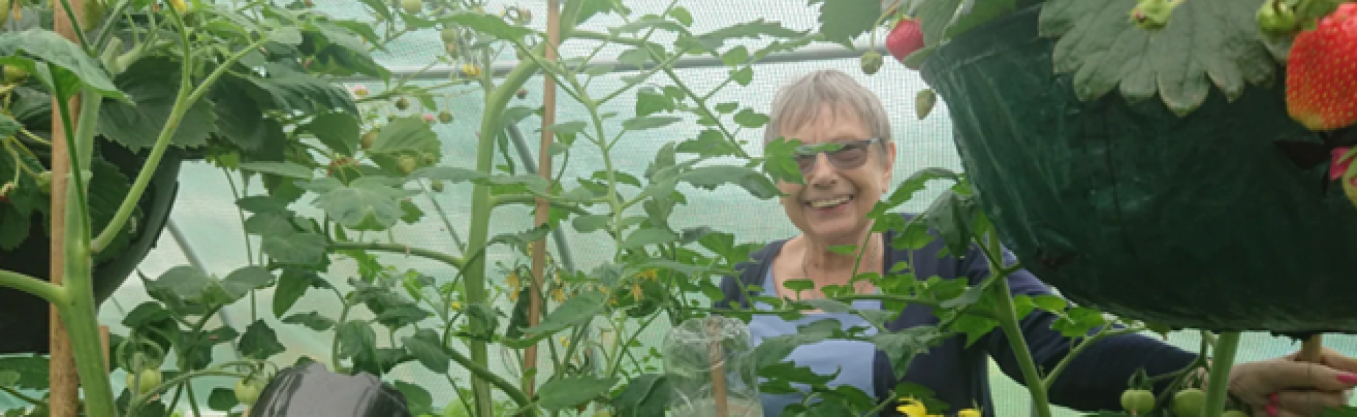 Image of a woman in the community garden