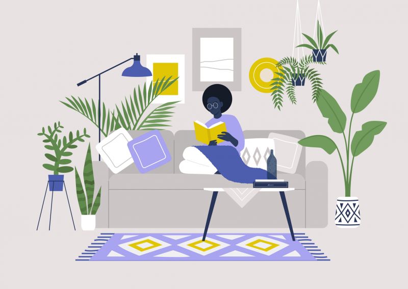 Woman reading on sofa